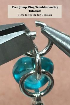 an image of a blue glass object being held by two metal hooks with the text free jump ring troubleshooting how to fix the top 3 issues