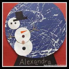 a paper plate with a snowman on it and the words alexandria written in black