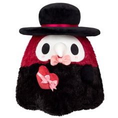 a red and black stuffed animal with a hat on it's head wearing a bow tie