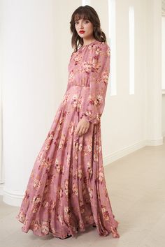 A timeless, flowy long-sleeve maxi crafted from soft vgeorgette fabric and fully lined for comfort. Featuring elegant fall florals, this elegant maxi blends classic style with effortless grace. Perfect for special occasion, it offers a flattering, sophisticated silhouette. LENGTH: 59" from top of shoulder FABRICATION: 100% VISCOSE Georgette and polyester lining STYLE#: DR-21723 AUTUMN DANCE BERRY-AUTDB + F24 *Dry Clean or wash on cold and hang flat to dry *Model is wearing size XS Long Sleeve Floral Maxi Dress, Cozy Sweaters Autumn, Pink Floral Maxi Dress, Really Long Hair, Fall Florals, Elegant Fall, Daytime Dresses, Long Sleeve Maxi, Formal Outfit