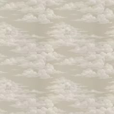 an image of clouds in the sky on a wallpaper background that looks like it has been painted