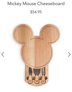 the mickey mouse cheese board is $ 64 95 and it's made out of wood