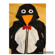 This hoodie is perfect for a penguin fan. Comes with a bow tie that snaps on and off so your hoodie can be washed. Wash inside out and lay flat to dry. To keep Your hoodie looking fresh and new I don't recommend drying in a dryer. These will be shipped first class, if your wanting a faster mail option priority starts at $9 for these. Click the link to add it to your cart. https://etsy.me/3jkEjHG If your ordering multiple items, then you need to select the $26 option. https://etsy.me/3kmxQNE Copy Fun Black Hoodie For Winter, Playful Black Hooded Hoodie, Penguin Costume, One Year Old, Change Of Address, New Me, First Class, Kids Hoodie, Bow Tie