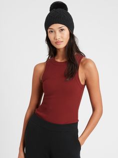 RIBBED KNIT: So soft, so stretchy, our micro-ribbed cotton jersey has been specially washed for an ultra-soft feel.  FITTED: Expertly tailored for a sporty, sleeveless silhouette that can still cover bra straps.  SHORT LENGTH: Designed to wear with mid-rise and high-rise styles.  Crew neck.  Straight hem.  Fitted.  Short body length - great with mid-rise and high-rise styles.  Body length (size S): Regular 23" Model: Size XS, 5'10" (178cm). Fitted Tank Top With Ribbed Neckline For Layering, Fitted Ribbed Tank Top For Layering, Everyday Fitted Ribbed Tank Top, High Stretch Seamless Cotton Tank Top, Sporty Ribbed Cotton Tank Top, Sporty Ribbed Tank Top For Layering, Fitted Ribbed Tank Top For Loungewear, Sporty Stretch Tank Top For Layering, Everyday Stretch Tank Top With Ribbed Neckline