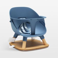 a blue high chair with wooden legs and an open seat on the bottom, in front of a white background