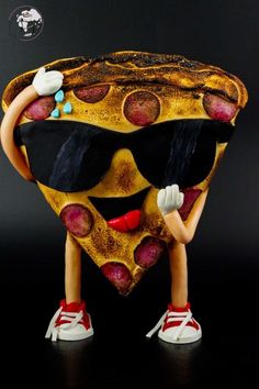 a piece of art that looks like a pizza with sunglasses on it's face