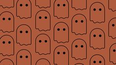 an orange background with black ghost heads