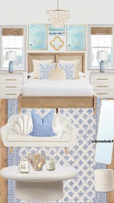 a bedroom with blue and white decor in it