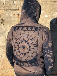 This is a made to order listing so please allow for up to 2 weeks for production time. Please select your desired size at checkout! This unisex size hoodie is hand dyed with a unique palmistry hand on the front. The back has a large astrology chart with an all seeing eye: This piece is a rich navy blue with our signature space wash effect! We added beautiful tribal fabric to both of the front pockets and the hood. Please note- the listing picture was taken outside in direct sunlight. The hoodie Hippie Hooded Festival Hoodie, Hippie Hooded Hoodie For Festivals, Black Bohemian Hoodie, Bohemian Hooded Hoodie For Festivals, Bohemian Hoodie For Festivals, Bohemian Cotton Hoodie For Festival, Hand Astrology, Boho Hoodie, Elephant Sweatshirt