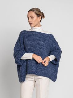 The extra-wide, luxurious pullover WILMA is handcrafted from a premium Peruvian alpaca and mohair blend and features an oversized boxy silhouette that guarantees an eye-catching look. Soft, warm, and extraordinary, it's perfect to pair with denim, trousers, skirts, and dresses. DETAILS -Extra wide oversized fit. -Boat neck -Hand-knitted. Blue colour. You can choose any other colour listed in the photo. Sustainable | Biodegradable | Zero synthetics Designed and ethically made in the North Europe, Winter Crop Top, Fluffy Alpaca, Winter Crops, North Europe, Pull Oversize, Alpaca Sweater, Embroidered Sweater, Pullover Sweater Women, And Dresses