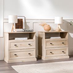 two wooden nightstands sitting next to each other on top of a hard wood floor