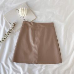 Brand Name: ZOKISilhouette: A-LINEMaterial: PUMaterial: Faux LeatherOrigin: CN(Origin)Waistline: empirePattern Type: SolidDresses Length: Above Knee, MiniAge: Ages 18-35 Years OldGender: WOMENModel Number: 8338Style: Casualskirt type: pu skirtsize: S/M/Lgender: girl girls women woman lady female mujerseason: Summeroccasion: daily/shopping/ working/ party/ homeskirt style: vintage/ casual/ office/ elegant/ luxuryfit: Fits true to size take your normal sizeDecoration: Zipperskirt color: 10 colorfa Slim Girl, Knee Skirts, Skirts Midi High Waisted, Half Skirt, Womens Tops Summer, Faux Leather Skirt, Fashion Design Clothes, Womens Designer Fashion, Fashion Korean