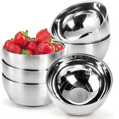 three stainless steel bowls with strawberries in them