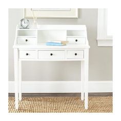 a white desk with two drawers and a clock on the top shelf next to it