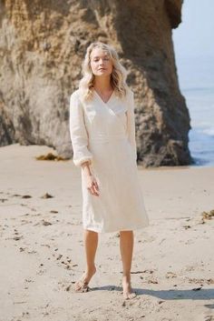 Winona wrap minimalist feminine dress for everyday. Midi length. 100% Linen. Made in California. The model is 5’7” (170cm) and wears a size XS. Luxury Summer Wrap Midi Dress, Luxury White Linen Daywear Dress, Luxury Linen Midi Party Dress, Fitted White Linen Luxury Dress, Luxury Elegant Linen Midi Dress, Luxury Fitted Linen Long Sleeve Dress, Luxury White Linen V-neck Dress, Chic Luxury White Linen Dress, Luxury Elegant Linen Dress