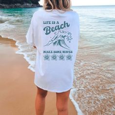 Get ready to make waves with our "Life is a Beach, Make Waves" Tee! Crafted for beach lovers and wave riders, this tee is your ticket to endless summer vibes and seaside adventures. Made from premium materials, our tee ensures comfort and durability, whether you're catching waves in the surf or soaking up the sun on the sand. The inspiring "Life is a Beach, Make Waves" design reminds you to embrace life's opportunities and create your own ripple effect wherever you go. Whether you're building sa Life Is A Beach, Cowgirl Shirts, Make Waves, Country Concert, Coastal Cowgirl, Beach T Shirts, Country Shirts, Comfort Colors Shirt, Concert Tees