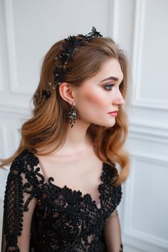 "A black hair piece with delicate handmade flowers made of lightweight fabric will decorate your chic look whether for a wedding for the bride or bridesmaid or for a graduation or other holiday. The flower hair vine is made with rhinestones, crystal beads, chiffon flowers, silver wires, metal elements. Medium-length earrings made of crystal. Hairpins that attach the vine to the hair, as a gift. The benefits of black flower vine and earring from the store Natassory: - high-quality materials in th Wedding Hair With Black Flowers, Black Hairpiece, Black Hair Piece, Black Headpiece, Black Hair Pieces, Princess Photoshoot, Witchy Wedding, Olympian Gods, Black Tiara