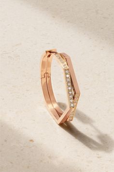 The angular lines of Repossi's 'Antifer' hoop earring are inspired by the steep cliffs of Normandy. It's made from 18-karat rose gold and dusted with 0.20-carats of pavé-set diamonds. Luxury Rose Gold Diamond Cut Hoop Earrings, Modern Rose Gold Diamond Hoop Earrings, Rose Diamond, Diamonds And Gold, Diamond Hoop Earrings, Rose Gold Jewelry, Fine Jewellery Earrings, Single Earring, Rose Earrings