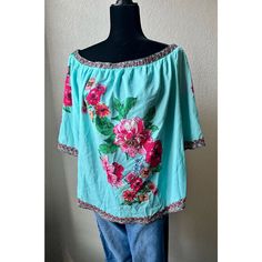 Off The Shoulder With Border Print On The Sleeves And Hem. No Stretch. Aqua Background. Great For A Boho Vibe. Turquoise Floral Print Top For Spring, Turquoise Floral Print Tops For Beach, Casual Turquoise Cotton Blouse, Turquoise Floral Print Top For Summer, Turquoise Floral Print Tops For Summer, Turquoise Cotton Beach Tops, Bohemian Turquoise Top With Floral Print, Turquoise Bohemian Floral Print Top, Bohemian Turquoise Floral Print Top