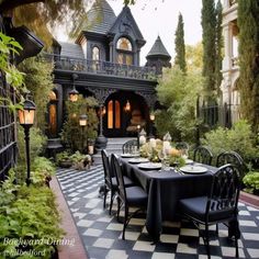 an outdoor dining area with black and white checkerboard flooring, chandelier, table set for four