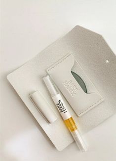 Packed in a vegan leather case, The Polisher and Cuticle Oil hydrate, condition cuticles, and add a natural shine—with only the purest ingredients. The Polisher’s glass and mineral blend gently bind keratin cells with no chipping and no dry time needed. Full Ingredient List:For Citrine Oil: Simmondsia Chinensis (Jojoba) Seed Oil, Olive Squalane, Ricinus Communis (Castor) Seed Oil, Vitus Vinifera (Grape) Seed oil, Prunus Amygdalus Dulcis (Sweet Almond) Oil, Sesamum Indicum (Sesame) Seed Oil, Hipp Nail Care Kit, Cuticle Oil Pen, Oil Pen, Nail Type, Nail Cuticle, Glass Nails, Manicure Kit, Care Kit, Essential Oil Fragrance