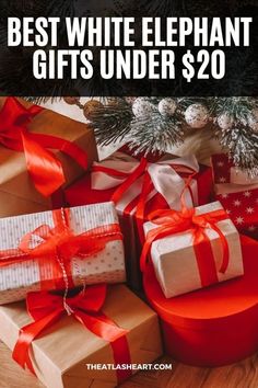 A close-up of gifts under a Christmas tree wrapped in red and white, with the text overlay, "Best White Elephant Gifts Under $20." Outdoorsy Women, Happy Money