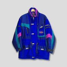 "Vintage 90's Multicolor Retro Skiing Bomber Parka Jacket Large Fablice Japan Snow Gear Jacket Outerwear Cold Weather Ski Wear Blue Hoodie Size L Please contact me for any questions about this clothing before buying. Size on tag : Size L (check measurements below) Measurement : Armpit to armpit : 24\" inches Back collar to hem (total length) : 30\" inches Weight : 1.33 kg Condition : Good Condition. No holes and stains. Delivery / Postage :- DHL EXPRESS / EXPEDITED = 3-5 business day. **WE ARE U Hooded Blue Skiing Outerwear, Blue Hooded Skiing Outerwear, Blue Long Sleeve Skiing Jacket, Blue Long Sleeve Outerwear For Skiing, Casual Blue Skiing Outerwear, Casual Blue Outerwear For Skiing, Retro Multicolor Outerwear For Outdoor Activities, Blue Sporty Ski Season Outerwear, Blue Hooded Ski Season Outerwear