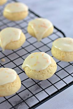 cookies with icing on a cooling rack