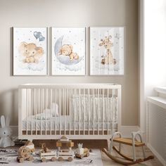 a baby's room with two pictures on the wall