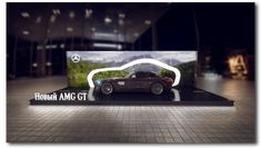 a car on display in front of a building at night with the words horsch amg ct above it