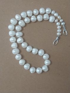 Men's freshwater pearls. Very large, suitable for big men. Sized to fit 18 1/2 to 19 1/2" collar size. Masculine. Tribal. Polynesian. Men’s Pearl Chain, Affordable White Multi-strand Pearl Necklace, White Large Multi-strand Beads, Hippie Necklace, Pearl Shell, White Freshwater Pearl, Big Men, Chain Styles, Fresh Water