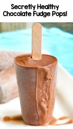 a chocolate fudge pops on a plate with the title secret healthy chocolate fudge pops