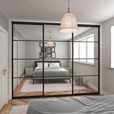 an image of a bedroom through glass doors