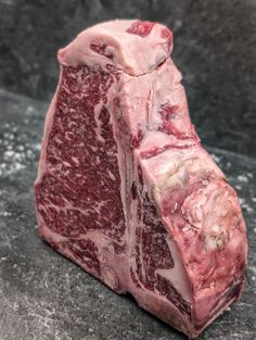 a piece of raw meat sitting on top of a counter