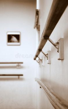 an empty hospital room with benches and pictures on the wall royalty images, black and white photography