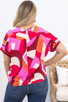 Product Details Colors: Pink, Orange, Hot Pink, Burgundy, Beige Print: Geometric Neckline: V-Neck Sleeve: Short Sleeve Hemline: Straight Brand: Staccato Material and Care 100% Rayon Hand Wash Cold Hang/Line Dry Size and Fit Small: Bust 46" Waist 44" Length 26" Medium: Bust 48" Waist 46" Length 26.5" Large: Bust 50" Waist 48" Length 27" Photo model is 5'7 and wearing a size small Video model is 5’7 and wearing size small Pink Printed V-neck Blouse, Multicolor Printed Split Neck Top, Red V-neck Top For Day Out, Chic Multicolor Top With Split Neck, Trendy Multicolor V-neck Blouse, Chic Multicolor Split Neck Tops, Concert Looks, Photo Model, Swimsuit Shops