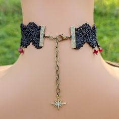 This vintage gothic styled crystal choker necklace features captivating Siam Red Swarovski crystals with nice crisp facets and brass embellishments. The detailed stampings have been in production since the 1940's and the vintage 16x11mm focal crystal is no longer in production, making this necklace a rare find. The lace is double-layered and hand sewn together for extra durability. Both elegant and stylish, this piece would be perfect for any formal occasion. Swarovski Crystals are made in Austr Vintage Red Choker For Party, Vintage Red Metal Choker, Vintage Metal Choker With Jewels, Vintage Red Choker Necklace, Red Vintage Choker Necklace, Handmade Red Vintage Choker, Vintage Beaded Choker As A Gift, Vintage Beaded Choker As Gift, Vintage Beaded Choker Gift