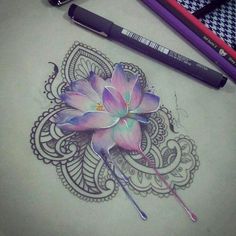 a drawing of a flower on paper with colored pencils next to it and two markers