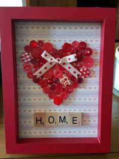 a red frame with buttons in the shape of a heart and words home on it