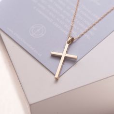 Crafted in 9ct solid yellow gold, this cross pendant is a staple for all jewellery collections. Featuring a polished finish, this pendant is made to last a lifetime. It therefore makes an ideal gift for a loved one that can be passed down for generations to come. The gorgeous thick cross pendant charm hangs beautifully on a yellow gold filled 16 or 18 Inch trace chain.  Your necklace arrives in a gorgeous hinged signature gift box.  Features: - 23mm 9ct yellow gold cross pendant - 16 or 18 Inch Classic Cross Pendant Necklace As Gift, Classic 14k Gold Cross Necklace For Gift, Classic 14k Gold Cross Necklace As Gift, Yellow Gold Cross Necklace Pendant As Gift, Necklace Gift Box, Wallpaper Android, Gold Cross Necklace, Gold Cross Pendant, Gold Cross