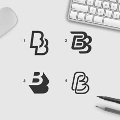 the letters b, b, and d are placed next to each other on a desk