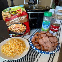 the meal is prepared and ready to be eaten on the kitchen table with the crock pot in the background