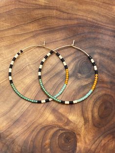 Gold filled 14/20 (not plated) beaded color block hoop earrings. Earrings measure 40 mm. *All orders come gift wrapped Earring Business, Gold Filled Hoops, Hoop Earrings Gold, Beaded Hoop Earrings, Beaded Hoops, Seed Bead Earrings, Bead Earrings, Jewelry Earrings Hoops, Jewelry Diy