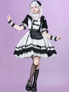 This price includes a dress, an apron and a pair of PU leather flutter sleeves.  Classic black and white color maid lolita OP dress, with heart embroidery applique apron, heart buckle belt on bodice and layered ruffles hemline.   	 		 			Size 			S 			M 			L 		 		 			Bust 			84 			88 			92 		 		 			Shoulders 			34 			36 			38 		 		 			Shoulder to Waist 			34 			35 			36 		 		 			Skirt Length 			45 			48 			50 		 		 			Waist 			64 			68 			74 		 		 			Sleeve Length 			21 			22 			23 Maid Dress Short, White Punk, Short One Piece, Black Apron, Op Dress, One Piece Black, Heart Embroidery, Maid Dress, Black And White Color