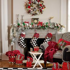 a living room decorated for christmas with stockings and presents