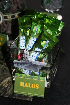 a container filled with halos sitting on top of a table