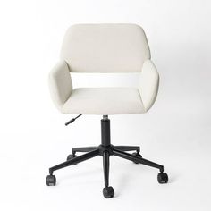 a white office chair sitting on top of a black casteors