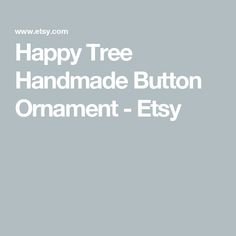 the happy tree handmade button ornament - etsy is shown in white