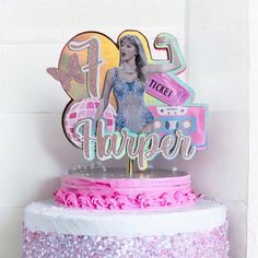 there is a cake that has the number twenty on it and an image of a woman