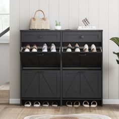 a shoe rack with several pairs of shoes in it